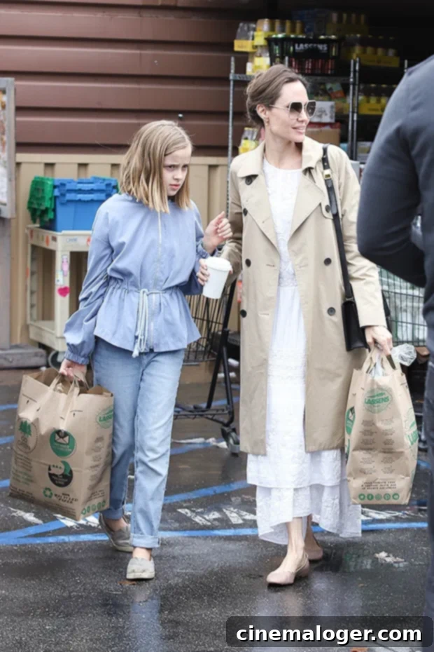 Angelina Jolie and Vivienne, 11, Brave Pandemic Grocery Aisles 2 Angelina Jolie & Vivienne Jolie-Pitt grocery shopping during Coronavirus concerns.