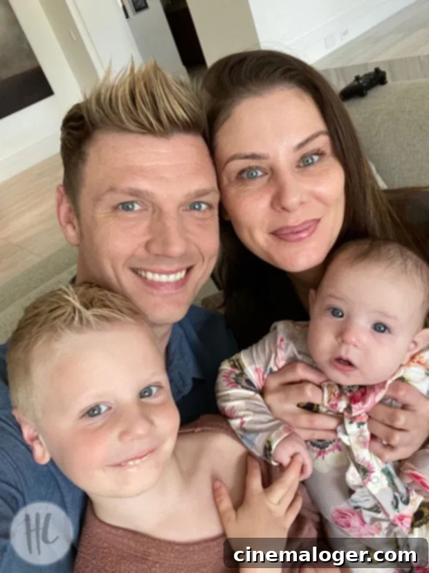 Nick Carter's Wife The Backstreet Boy's Quarantine Workout Secret 2 Nick Carter and family posing for a selfie at home during quarantine.