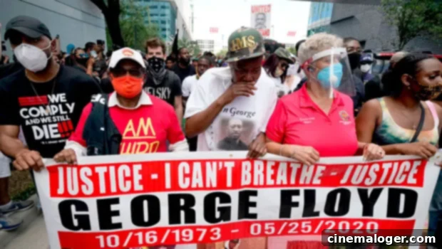 George Floyd's Family Marches In Houston, Powerful Images Emerge 2 George Floyd's family marching with protestors in Houston