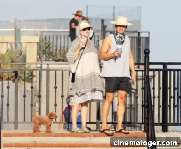 Beachside Bliss: Katy Perry's Baby Bump Joins Orlando Bloom for Romantic Stroll 2 Katy Perry and Orlando Bloom