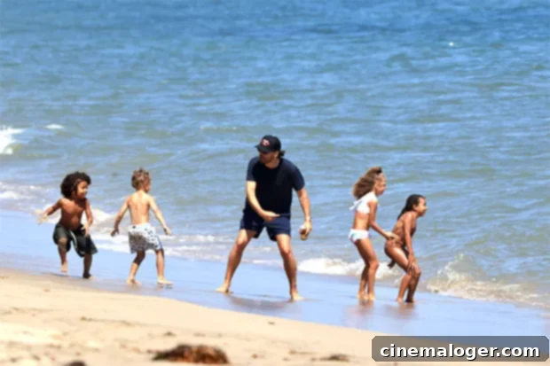 Scott Disick's Masterclass In Unclehood With Kardashian Kids On The Beach 2 scott disick, north west, saint west, reign disick