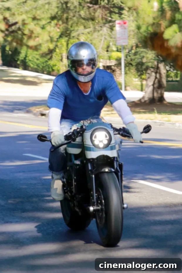 Brad Pitt Bikes To Angelina Jolie's Home Weeks After Twins' Birthday 2 Brad Pitt arrives via motorcycle at ex Angelina Jolie’s Los Feliz home on July 28, 2020.