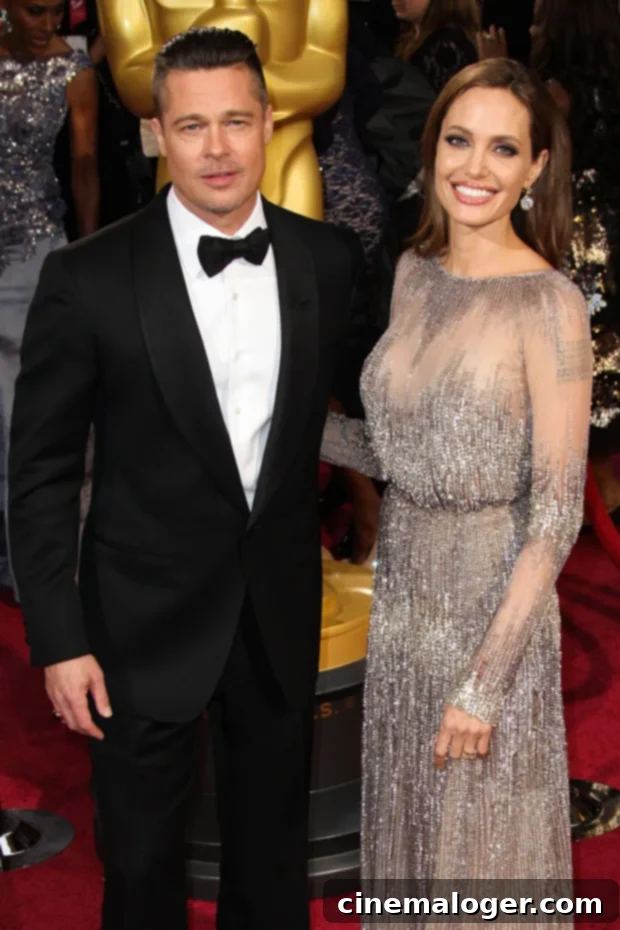 Brad Pitt Bikes To Angelina Jolie's Home Weeks After Twins' Birthday 3 Brad Pitt and Angelina Jolie at the 86th Annual Academy Awards on March 2, 2014.
