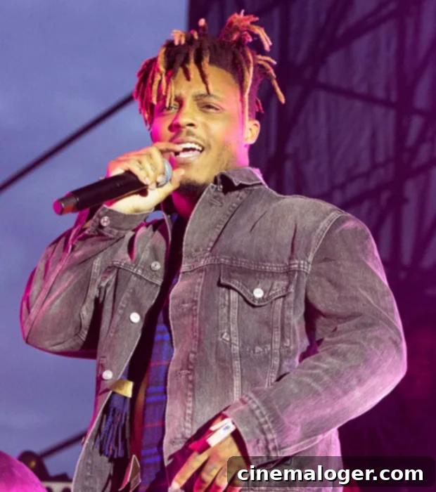 Echoes of Solace Juice WRLDs Voice Returns with The Weeknd 2 Juice WRLD performs on stage, captured in a dynamic moment.