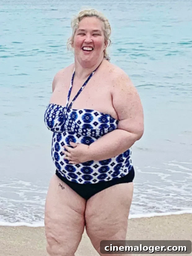 Mama June's Stylist Shares The Secret To Her Cute Easy New Hair 2 Mama June on Jensen Beach with long, layered blonde hair, casually dressed, before her bob haircut.