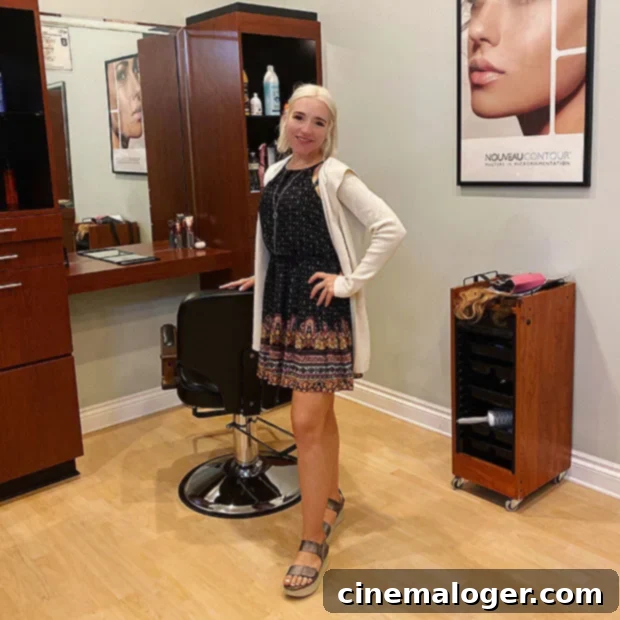 Mama June's Stylist Shares The Secret To Her Cute Easy New Hair 3 Greta Iingenfelter, the talented hairstylist behind Mama June's blonde bob makeover, smiling confidently.