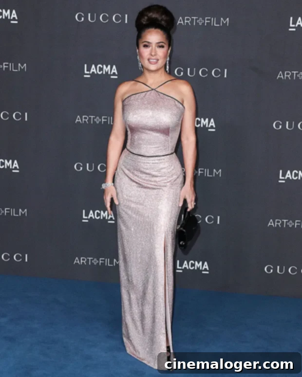 Salma Hayek, 53, Stuns Poolside In A Vibrant Red Swimsuit 2 salma