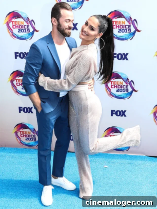 Nikki Bella and Artem Chigvintsev Snuggle Up on Adorable Beach Date With Newborn Matteo 2 nikki