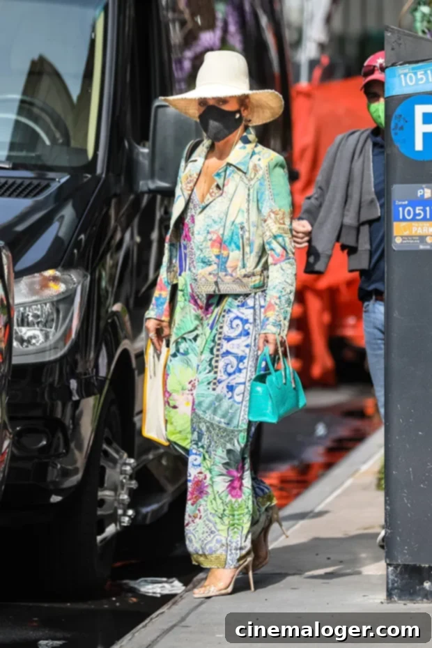 Isolation Chic: Kourtney, J.Lo & The Week's Top Celebrity Looks 3 Jennifer Lopez in a multi-colored caftan and matching jacket