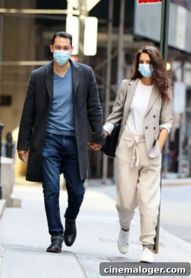Katie Holmes, 41, Locks Lips With New Love Emilio Vitolo Jr., 33, During Romantic NYC Dinner 3 Katie Holmes and Emilio Vitolo Jr. are pictured holding hands during a romantic stroll on Sept. 21, 2020, in New York City.