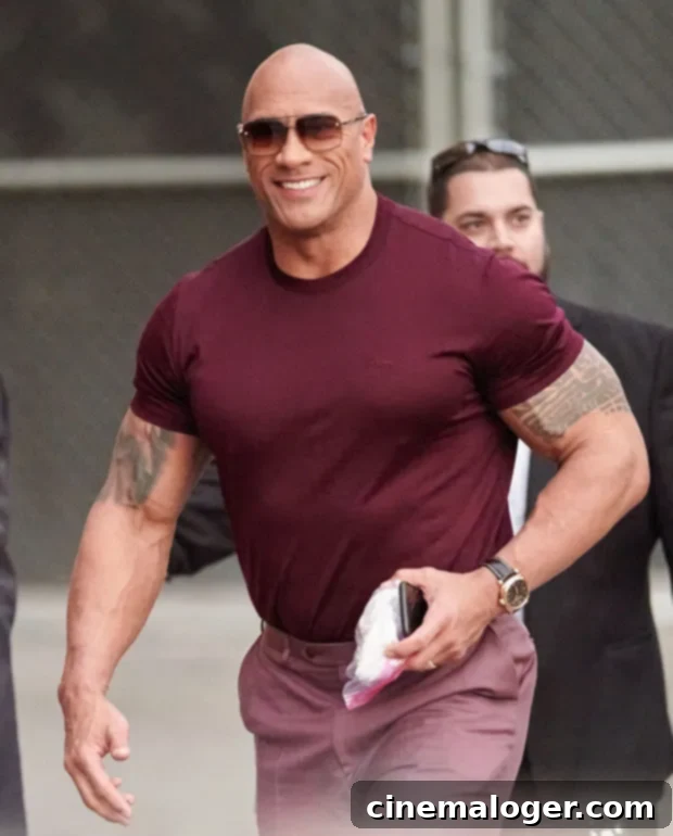 The Rock's Sunday Workout Arms Reach Astounding New Size 2 Dwayne 'The Rock' Johnson proudly showing off his significantly bulked-up arm muscles and physique during a workout session, a testament to his quarantine training.