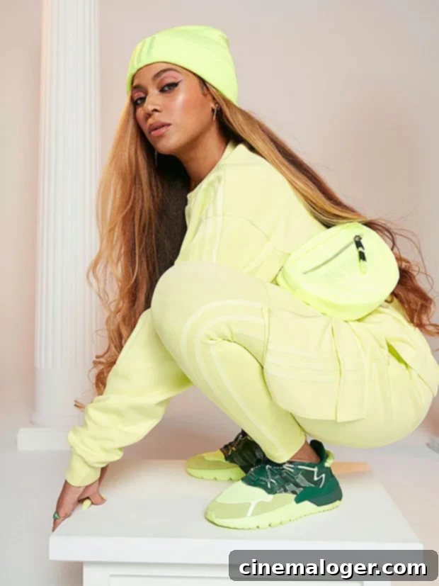 Beyonce IVY Park x adidas Drop 2 Sultry Suits and Sleek Sports Bras 4 Beyoncé showcases a distinctive IVY PARK x adidas Drip 2 ensemble, featuring mixed textures and a relaxed fit, highlighting the collection's adaptability and modern design.