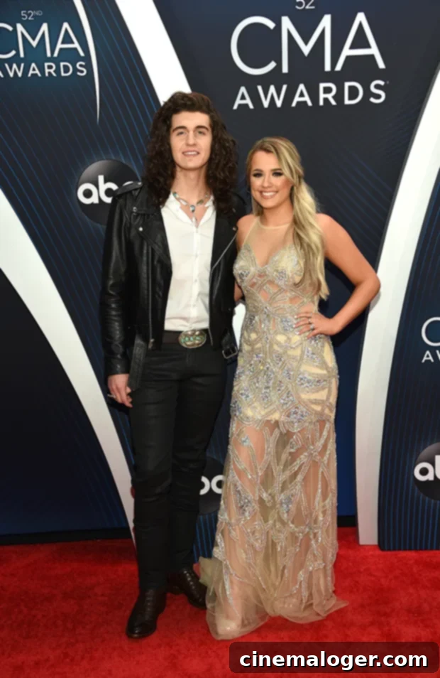 Gabby Barrett and Cade Foehner Their Journey From Idol Stage to Family Life 3 Gabby Barrett and Cade Foehner wedding photo, smiling at each other