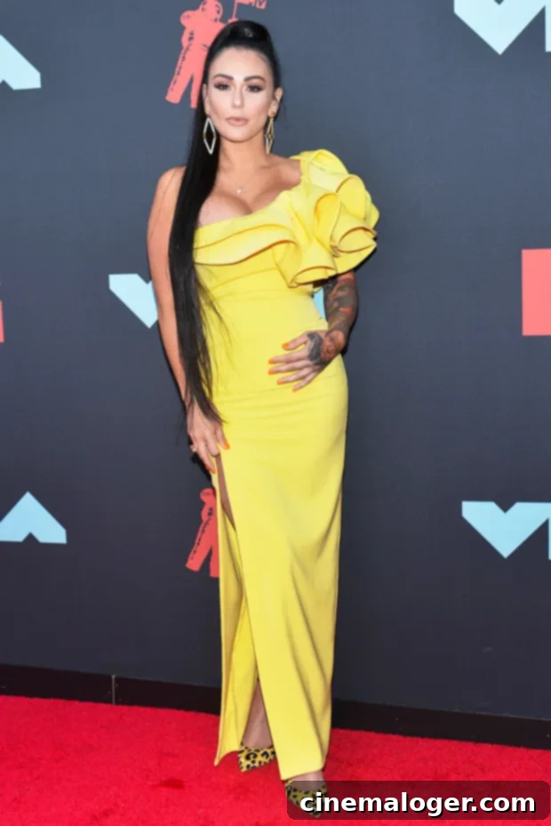 JWoww's 4-Year-Old Son's Remarkable Reading Journey Two Years Post-Autism Diagnosis 2 Jenni Farley JWoww arriving on the red carpet at the 2019 MTV Video Music Awards