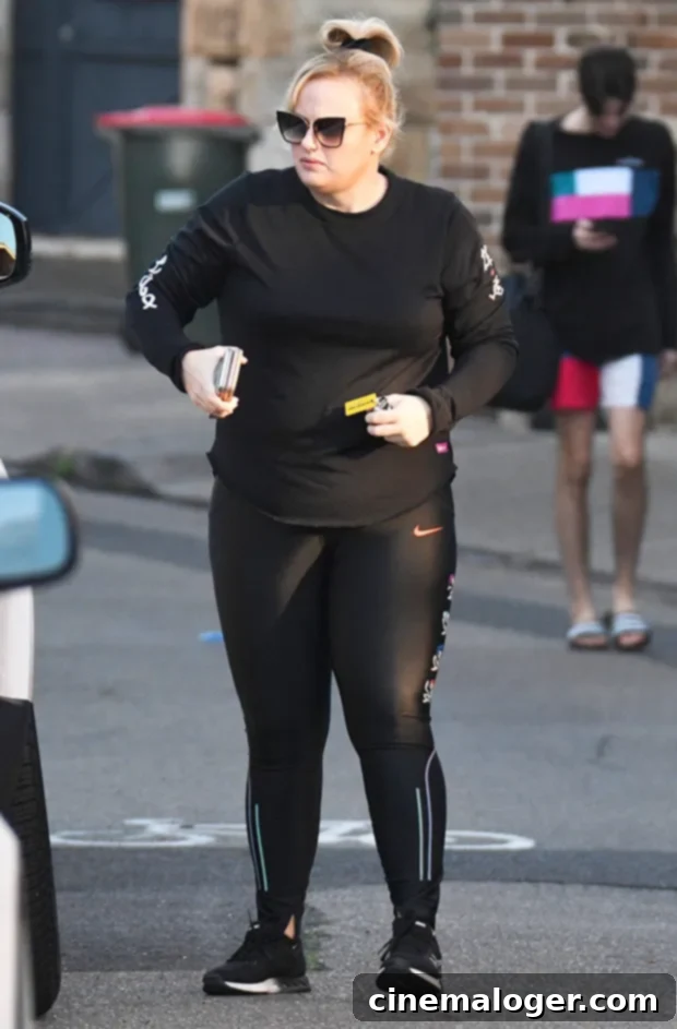 Rebel Wilson Dazzles In Sparkly Turtleneck Following 60-Pound Transformation 2 rebel wilson