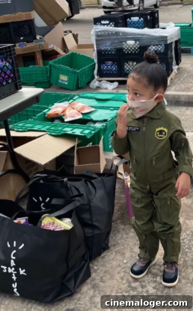 Tiny Helper Stormi, 2, Masks Up For Dad Travis Scott's Houston Toy Drive 2 Stormi Webster