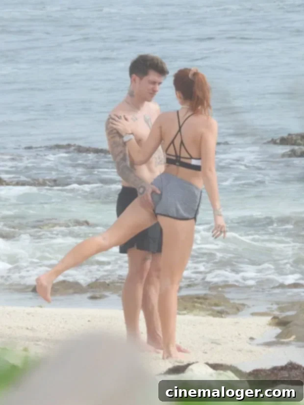 Bella Thorne and Benjamin Mascolo Pack on PDA During Mexico Bikini Workout 3 Benjamin Mascolo embracing Bella Thorne during her beach workout