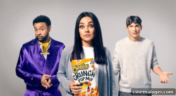 Shaggy Joins Ashton and Mila for a Cheetos Super Bowl Confession 2 Mila Kunis with orange fingers, a humorous nod to the Cheetos commercial where she's caught stealing snacks, implying 'orange fingers, red flags.'