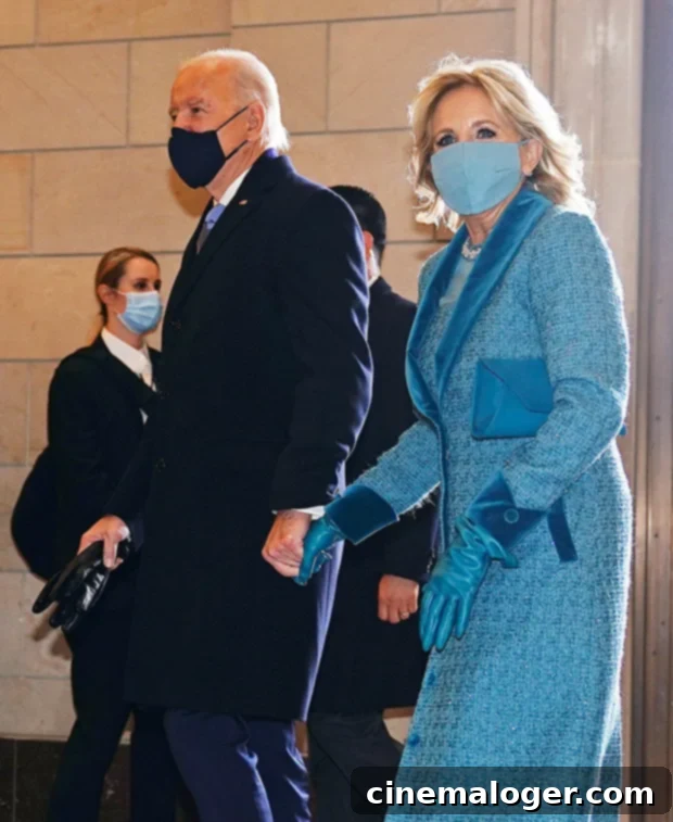 Dr. Jill Biden Radiates Regal Elegance in Ocean Blue Tweed for Inauguration 2 Dr. Jill Biden in her ocean blue Markarian coat and dress at the Presidential Inauguration, symbolizing hope and American design.