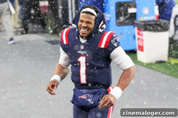 Cam Newton'dan Tarz Evrimi İtirafı: 2021'de Lüks Modaya Paydos! 2 Cam Newton in his Patriots jersey, walking off the field after a game.