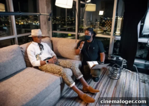 Cam Newton'dan Tarz Evrimi İtirafı: 2021'de Lüks Modaya Paydos! 5 Cam Newton smiling, wearing a stylish hat and jacket, in an ad for Downy Defy.