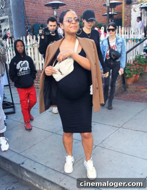 Pregnant Christina Milian Owns Her Baby Bump In Sultry Savage X Fenty Lingerie 2 Christina Milian showcasing her baby bump in purple Savage X Fenty lingerie