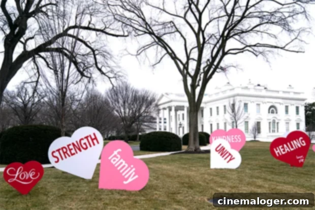 Jill Biden Unveils White House Valentine's Display, Joe Takes a Look 2 Dr. Jill Biden's Valentine's Day decorations on the White House lawn, featuring large, colorful hearts.