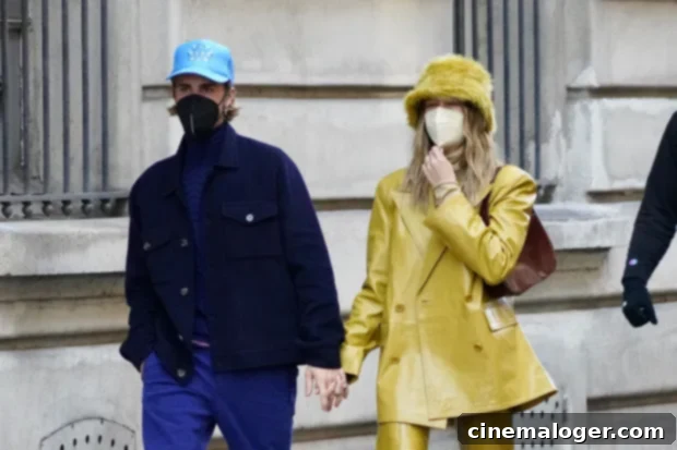 5 Furry Bucket Hats That Copy Hailey Baldwin For Less 2 Hailey Baldwin sports a fuzzy yellow bucket hat while holding hands with Justin Bieber for a walk in Paris, France on Feb. 28, 2021.
