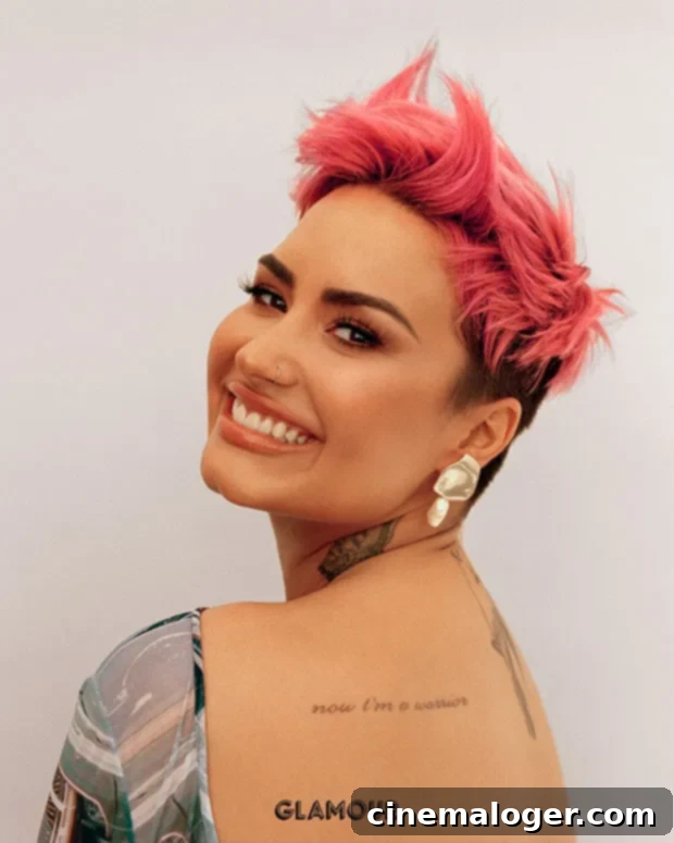 Demi Lovato looking confident and powerful, a true warrior, in a reflective pose.