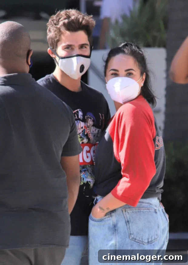 Demi Lovato and Max Ehrich shopping on Rodeo Drive in July 2020, during their engagement.