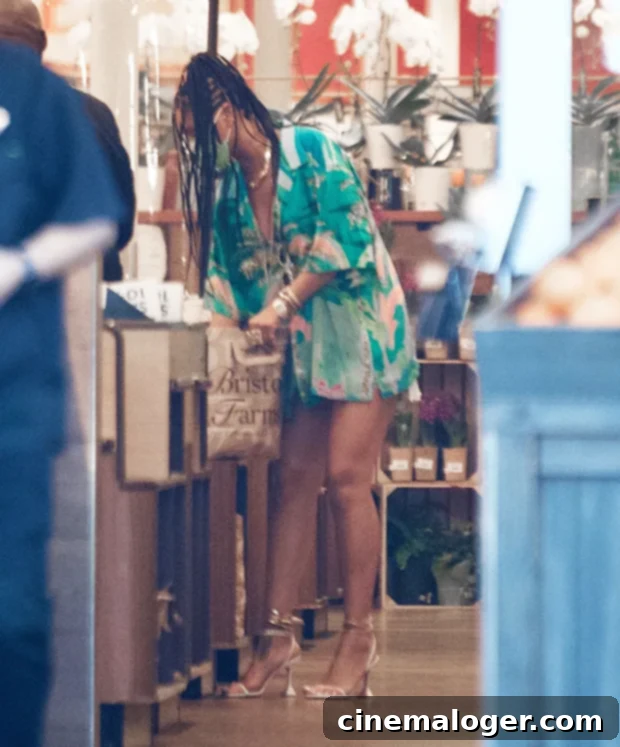 Rihanna's Everyday Glam: Groceries, Braids, Mini Skirt 3 Rihanna bagging her own groceries at Bristol Farms in Beverly Hills