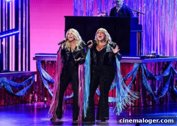 Miranda Lambert Electrifies ACMs with Bedazzled Leather and Potent Drunk Performance 2 Miranda Lambert and Elle King performing their hit song 'Drunk (And I Don't Wanna Go Home)' live at the ACM Awards, both dressed in stylish coordinated outfits.
