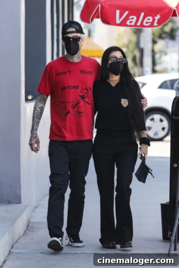 Kourtney and Travis' Intimate Beach Snuggles Revealed 3 Travis Barker and Kourtney Kardashian