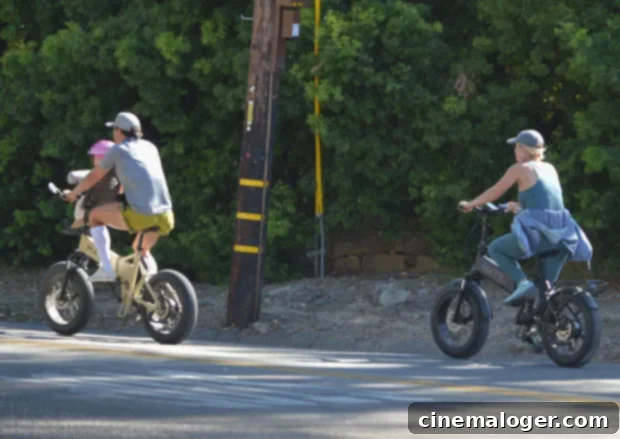 Katy Perry and Orlando Bloom Enjoy Santa Barbara Bike Ride with 8-Month-Old Daughter Daisy Dove 3 Katy Perry, Orlando Bloom, Daisy looking like doting parents
