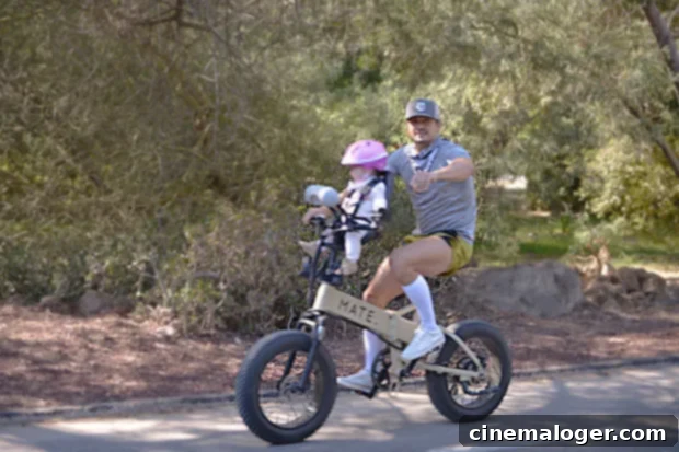 Katy Perry and Orlando Bloom Enjoy Santa Barbara Bike Ride with 8-Month-Old Daughter Daisy Dove 4 Orlando Bloom looking content while on a bike with his daughter Daisy