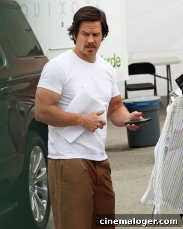 Mark Wahlberg, 49, Dramatically Gains 20 Pounds for 'Father Stu' 2 Mark Wahlberg on the set of Father Stu, having gained weight for the role.