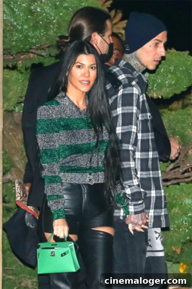 Kourtney Kardashian's Latest Fashion Statement: Blink 182 for Travis Barker 2 Kourtney Kardashian Travis Barker blink 182 hoodie