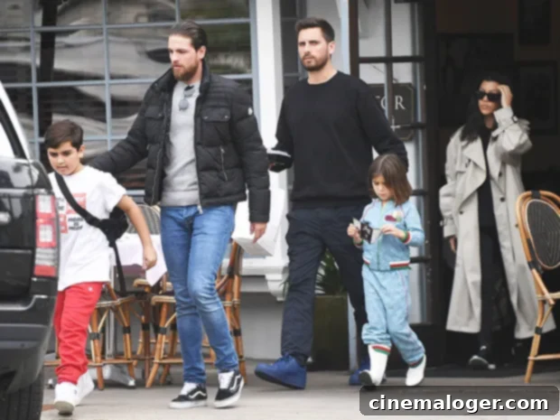 KUWTK Finale: Scott Disick Lets Go of Kourtney Dream 3 Scott Disick and Kourtney Kardashian out with their children, demonstrating harmonious co-parenting