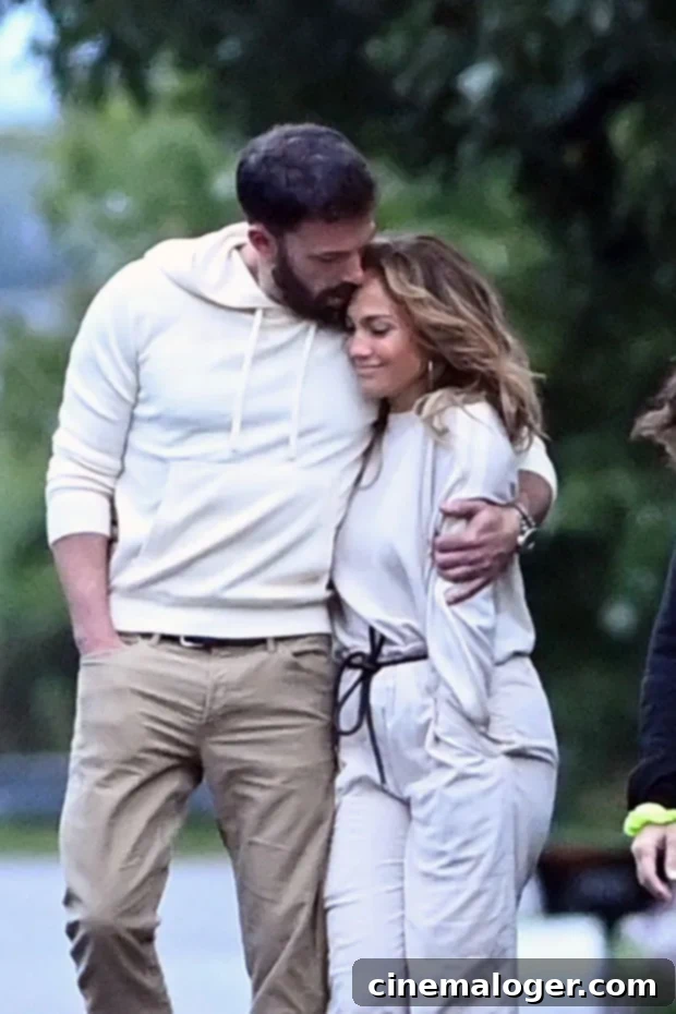 Ben Affleck and Jennifer Lopez Get Cozy on Romantic Hamptons Stroll 3 Ben Affleck holds Jennifer Lopez close during their romantic Hamptons walk.