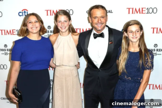 Gracie McGraw Unveils Bold Peachy Short Hair 2 Gracie McGraw with her father Tim McGraw and sisters