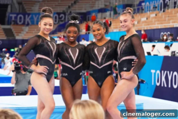 Simone Biles and Team USA Gymnasts: The Reason They Skipped Tokyo's Opening Ceremony 2 Simone Biles and other gymnasts after a practice session in Tokyo, wearing training gear.