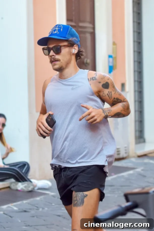 Harry Styles' Biceps Pop Post-Gym With Olivia Wilde 2 Harry Styles
