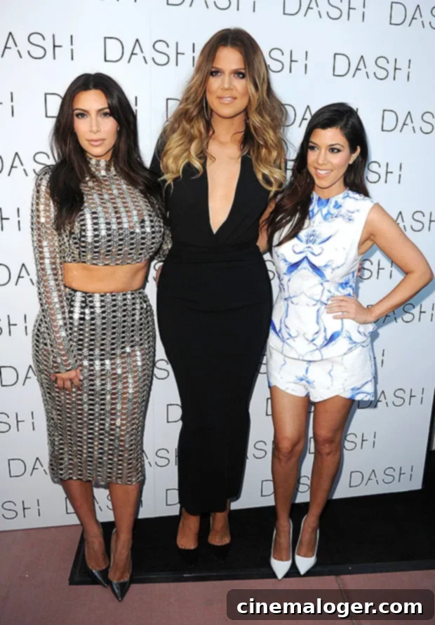 Kim K to Host SNL Season Opener: Will Her Sisters Crash the Party? 2 Kourtney Kardashian, Khloe Kardashian and Kim Kardashian pose together during an event.