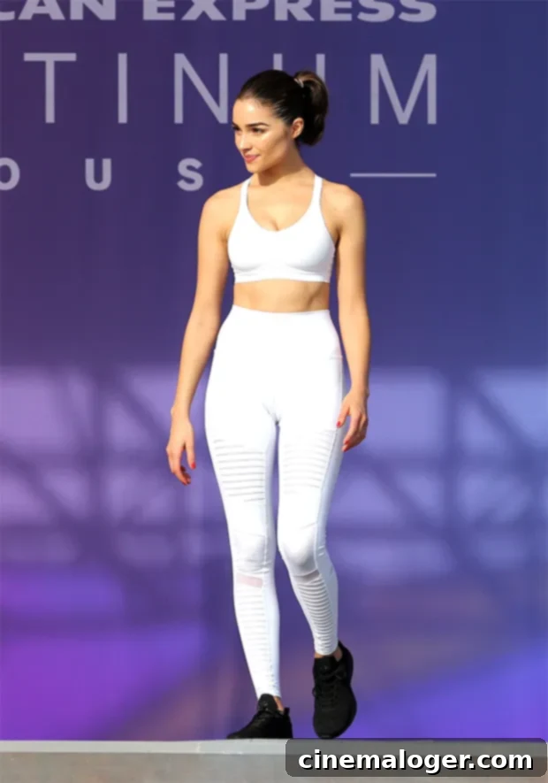 SI Swim Model Olivia Culpo's Secret to Healthy, Delicious Meals 2 Olivia Culpo in a white workout set