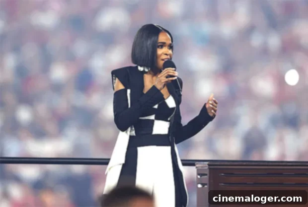 Michelle Williams Anthem Performance Ignites NFL Opener Crowd 2 Michelle Williams performing the national anthem at the NFL Kickoff game on September 9, 2021.