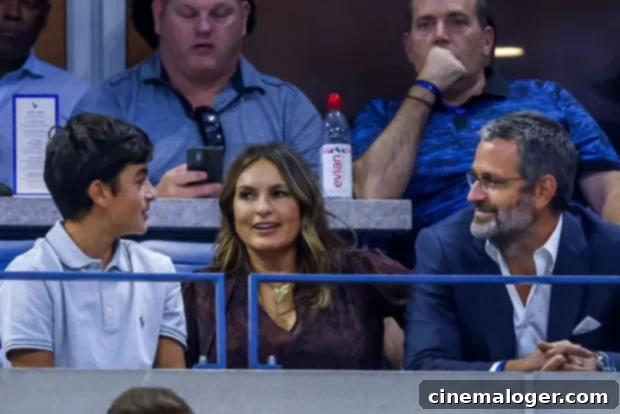 Christopher Meloni Surprises Mariska Hargitay at US Open 2 Mariska Hargitay smiles widely at the US Open, an image reflecting her joy during the event and her reunion with Christopher Meloni.