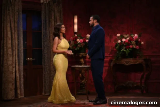 Kim Kardashian's Hilarious Dream Guy Search: Amy Schumer & Chris Rock Make The Cut 4 Kim Kardashian, portraying Rochelle, hands a token to actor Jesse Williams during 'The Dream Guy' dating sketch on Saturday Night Live, praising his attractiveness despite limited interaction.
