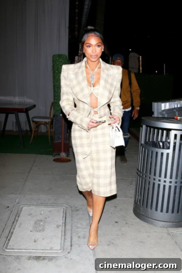 Lori Harvey Rocks Plaid Crop Top and Skirt for Solo Night 2 Lori Harvey