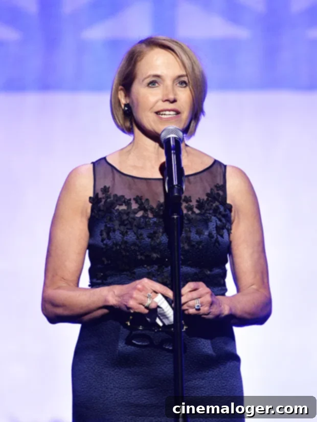 Katie Couric Details Seven-Year Teen Bulimia Struggle Her Aspiration To Be Thin 2 Katie Couric, journalist, speaking at an event, captured in a thoughtful pose.