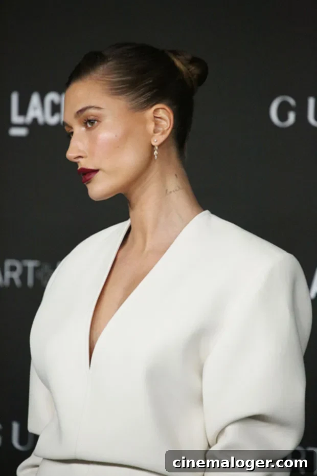 Hailey Baldwin Channels Runway Chic in Plunging White Gown at LACMA Art & Film Gala 2 Hailey Baldwin in an elegant white gown at the LACMA Art + Film Gala